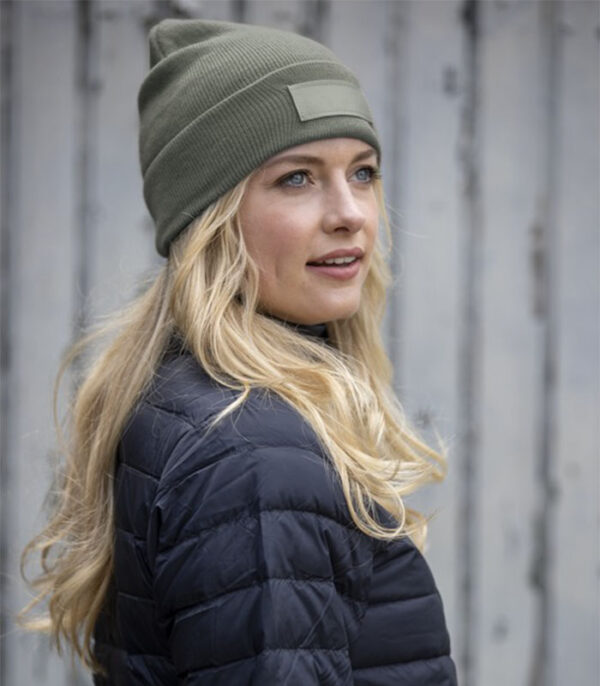 Modell i Boreas mössa med lapp